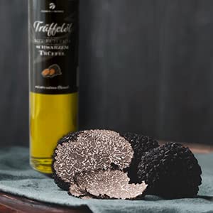 Truffle oil with real black truffle - based on extra virgin olive oil. For sauces and to refine dishes. Suitable for a vegan diet