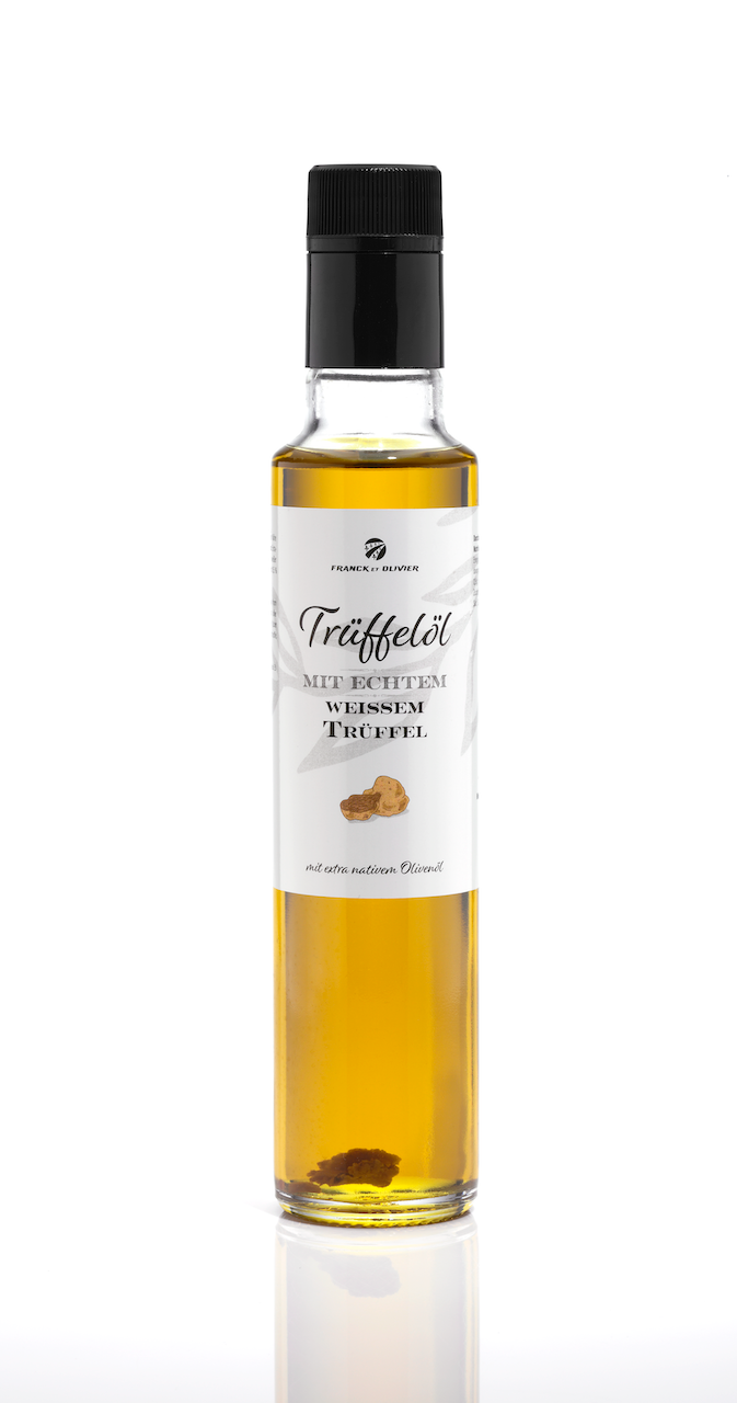 Truffle oil with real white truffle - based on extra virgin olive oil. For sauces and to refine dishes