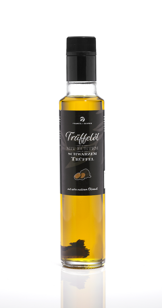 Truffle oil with real black truffle - based on extra virgin olive oil. For sauces and to refine dishes. Suitable for a vegan diet